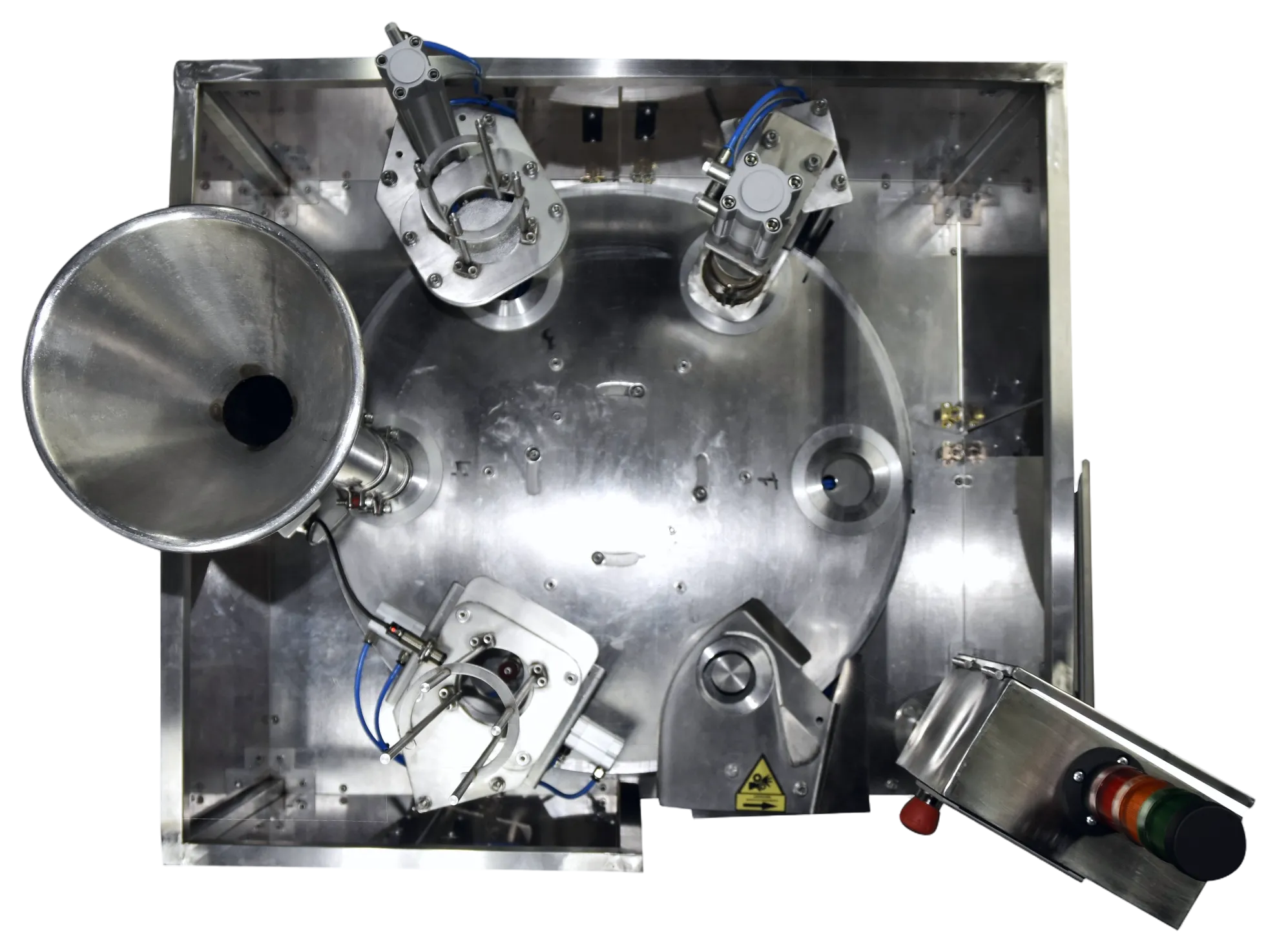 Top-down view of the rotary filler turret, hopper and dosing heads